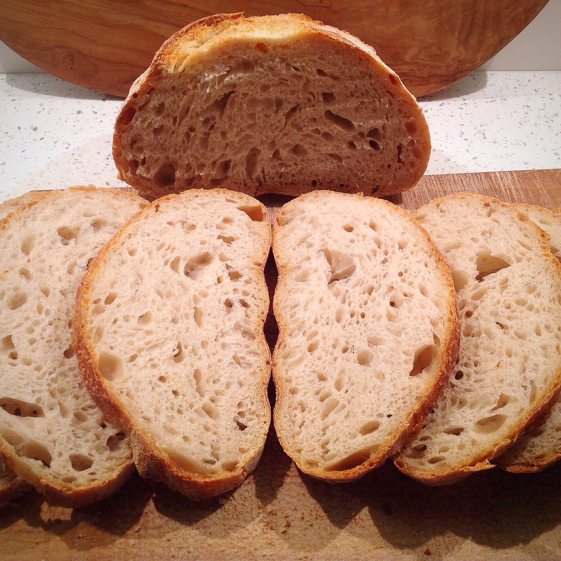 A close up of slices of bread on a cutting board