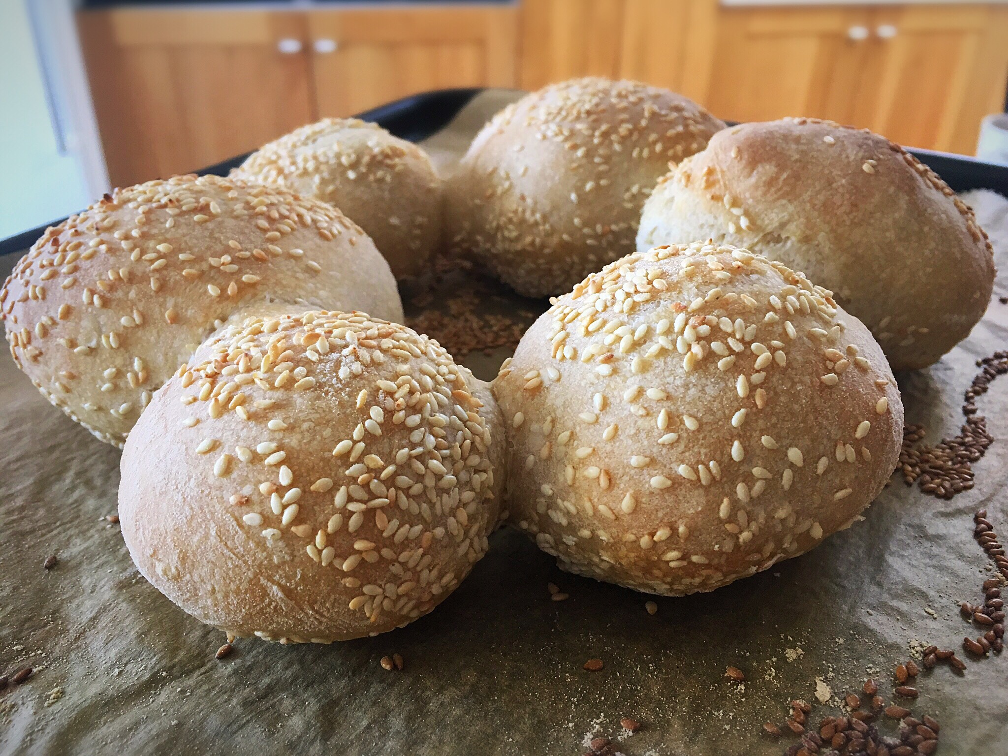 A bunch of bread rolls are sitting on the table