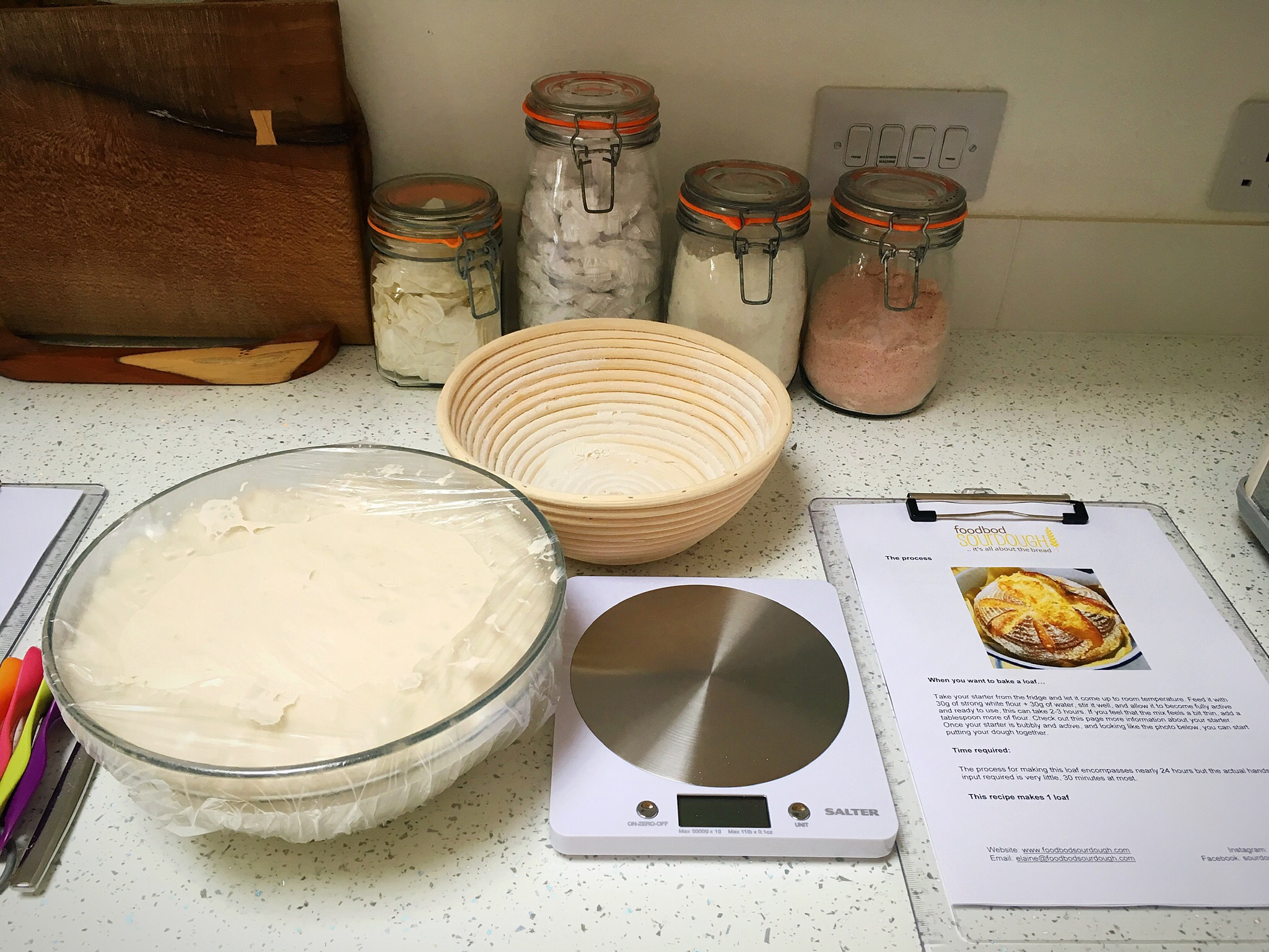 A counter with some food and a scale