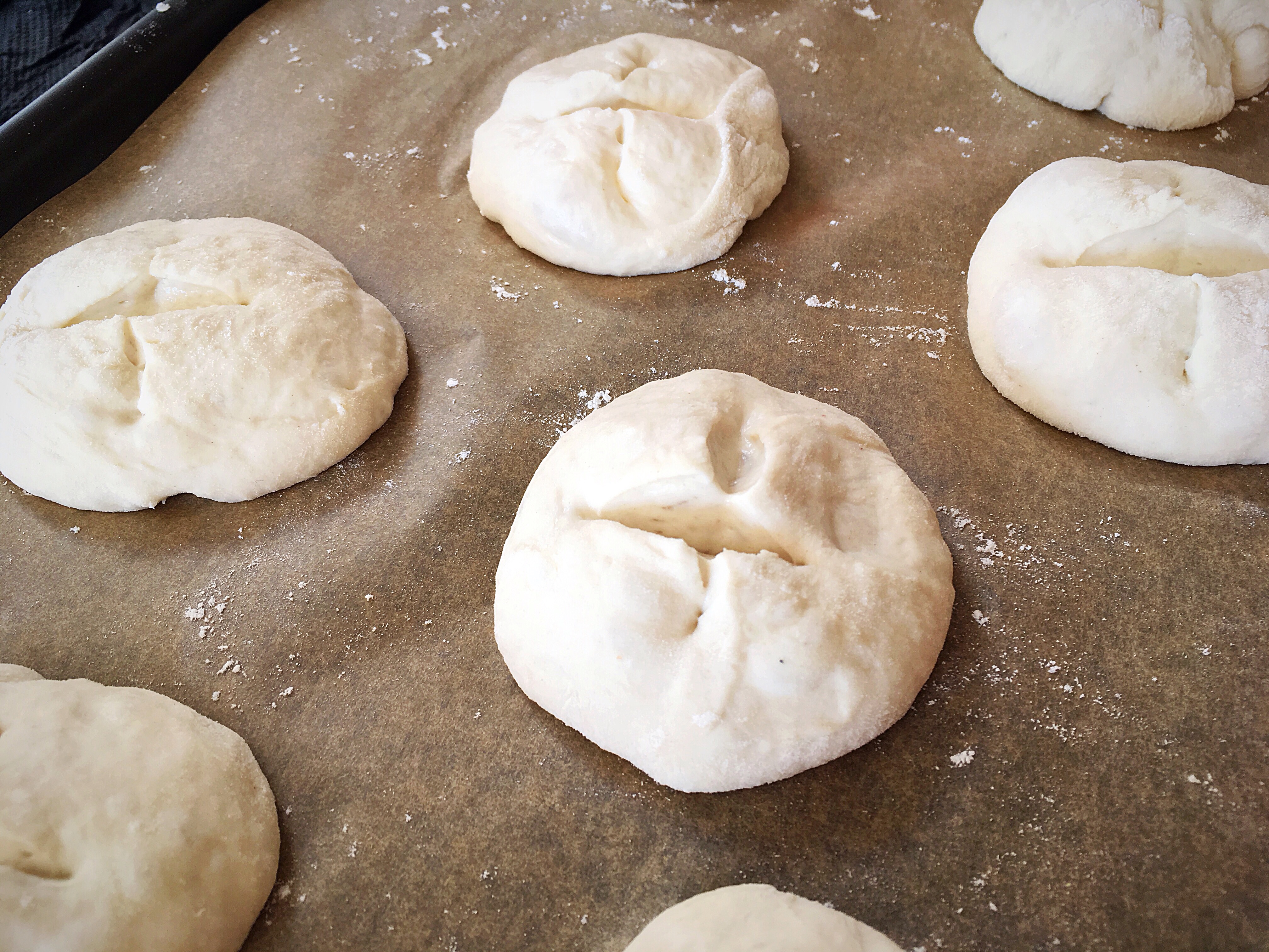 A close up of some dough on the pan