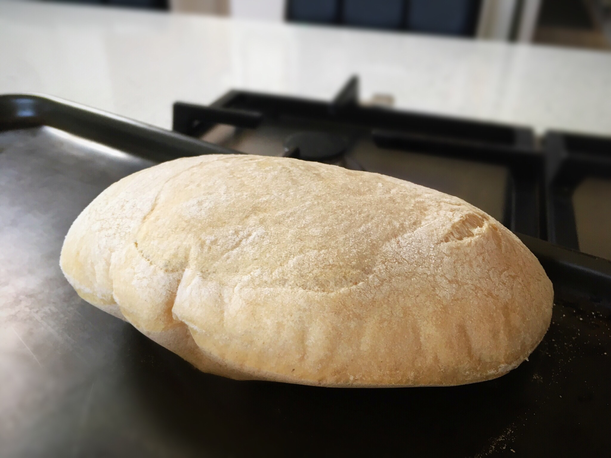 A close up of a bread on top of a table