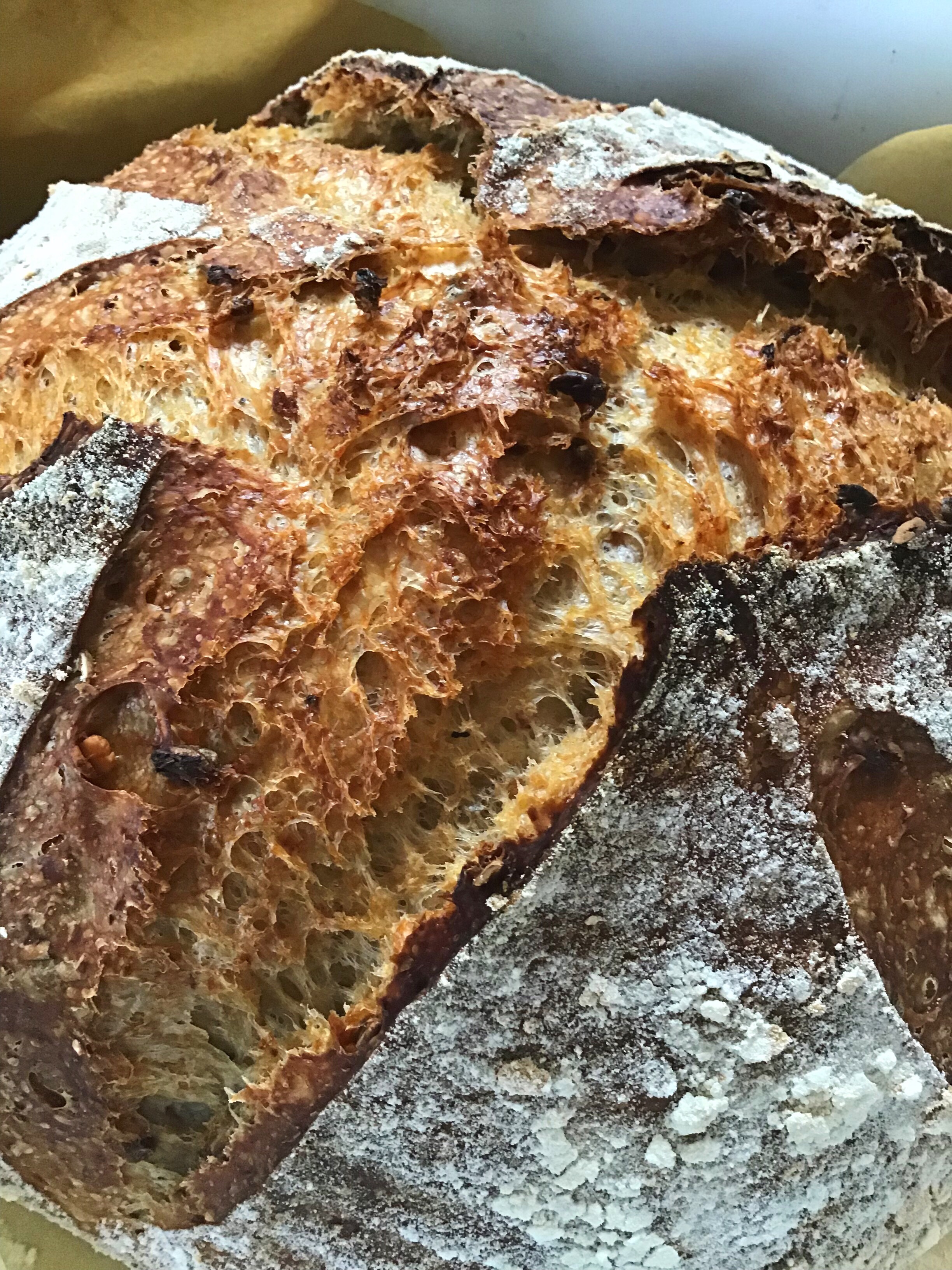 A piece of bread is on top of foil.