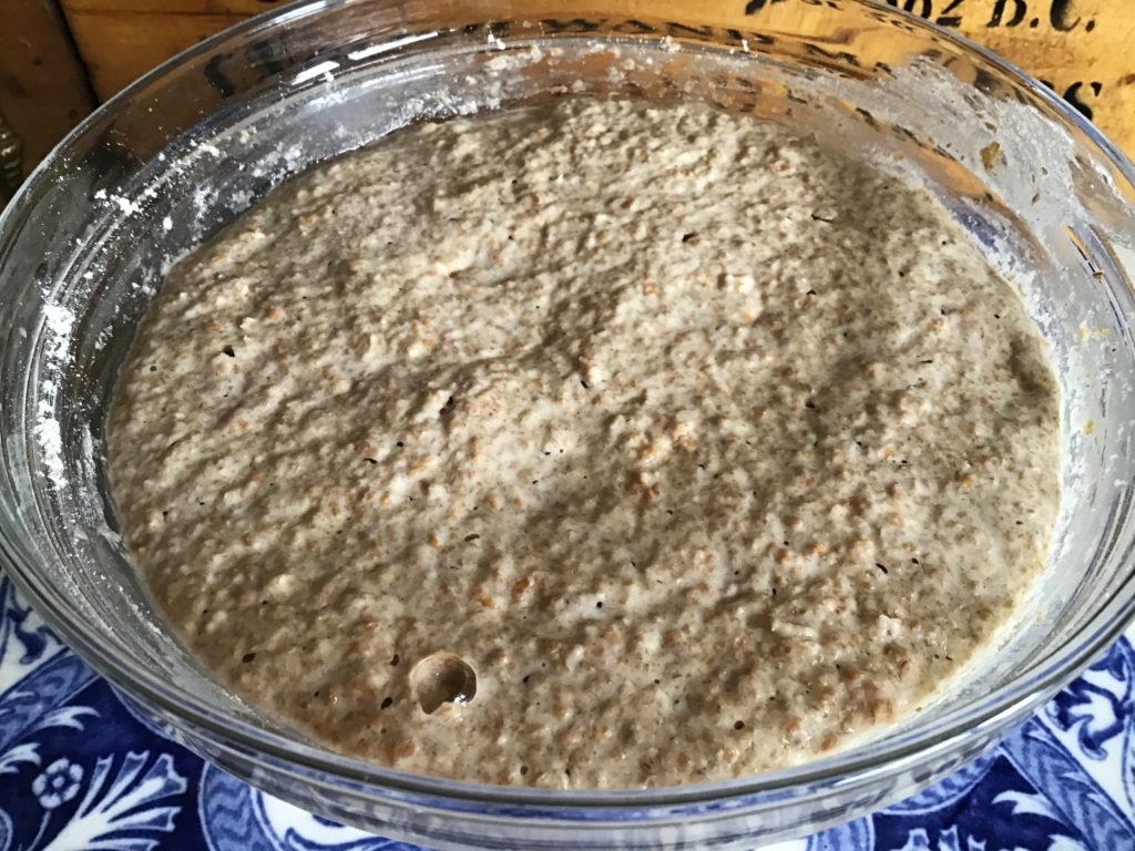 A bowl of food that is sitting on the table.