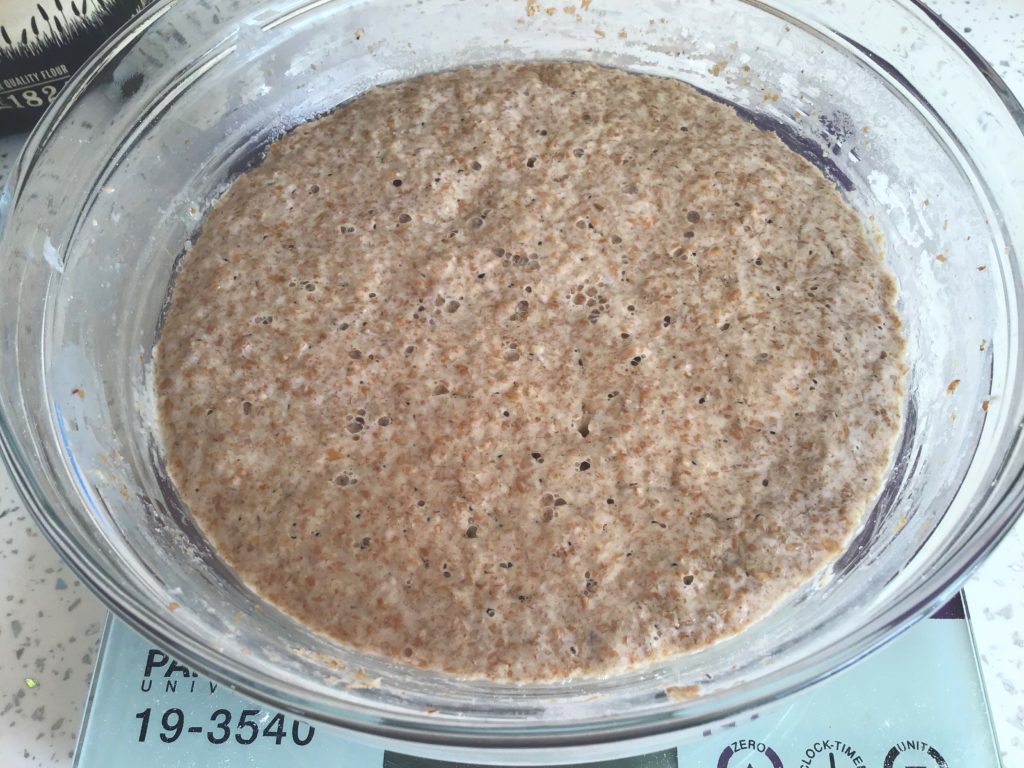 A bowl of oatmeal sitting on top of a table.