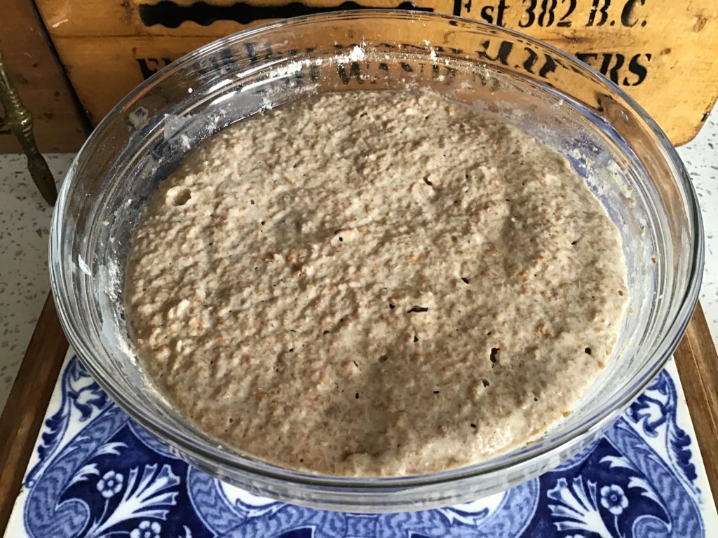 A bowl of food on top of a table.