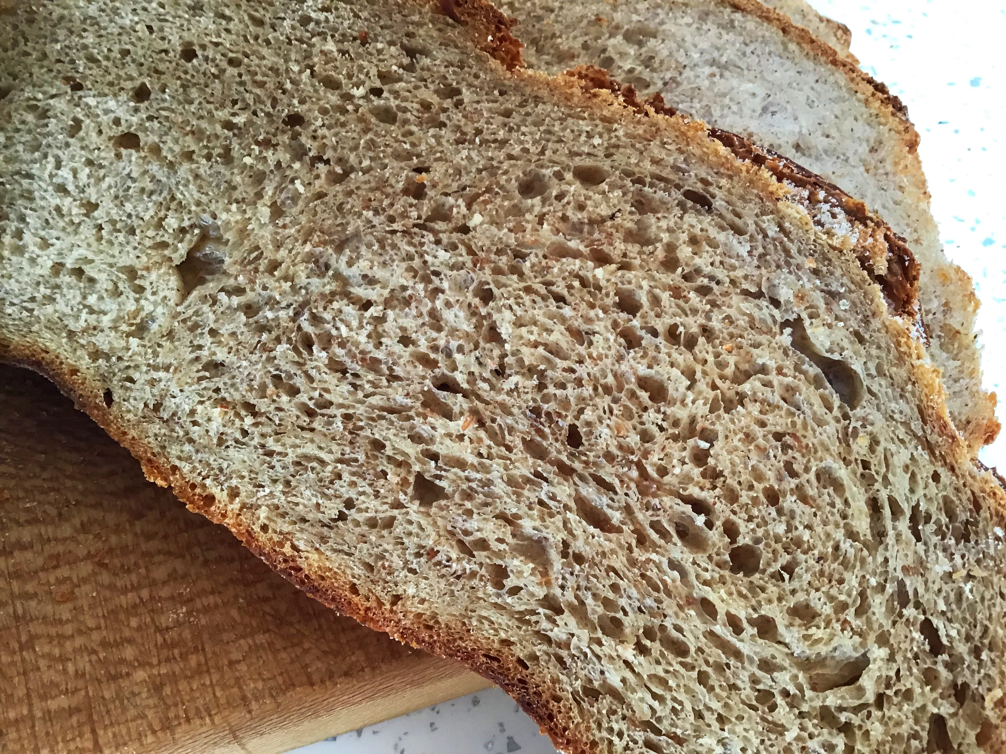 A close up of some bread on a cutting board