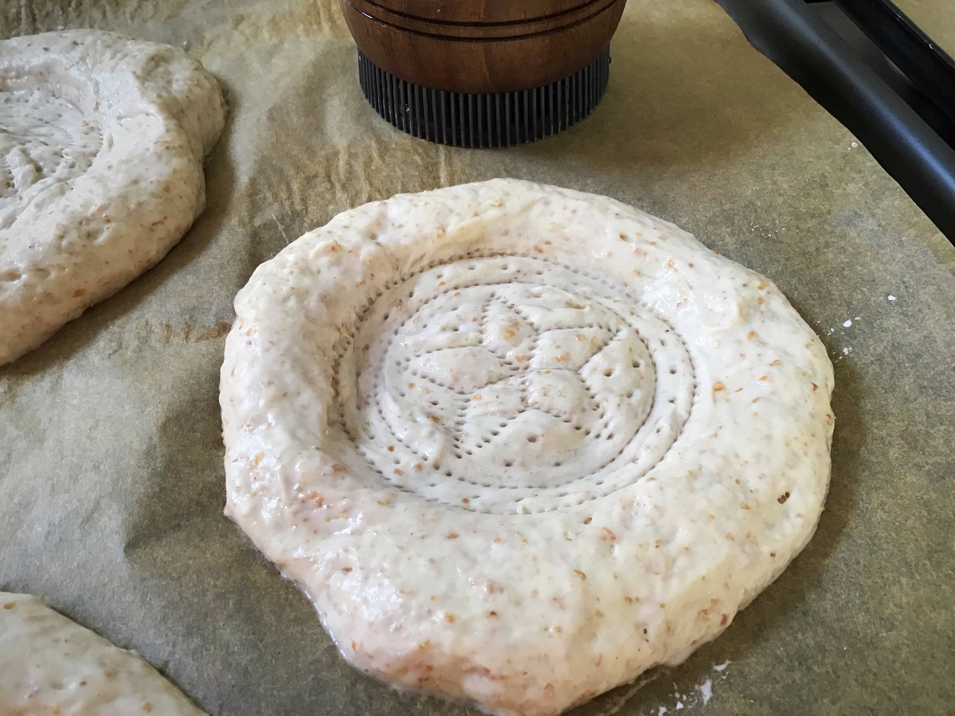 A round pastry with a star design on it.