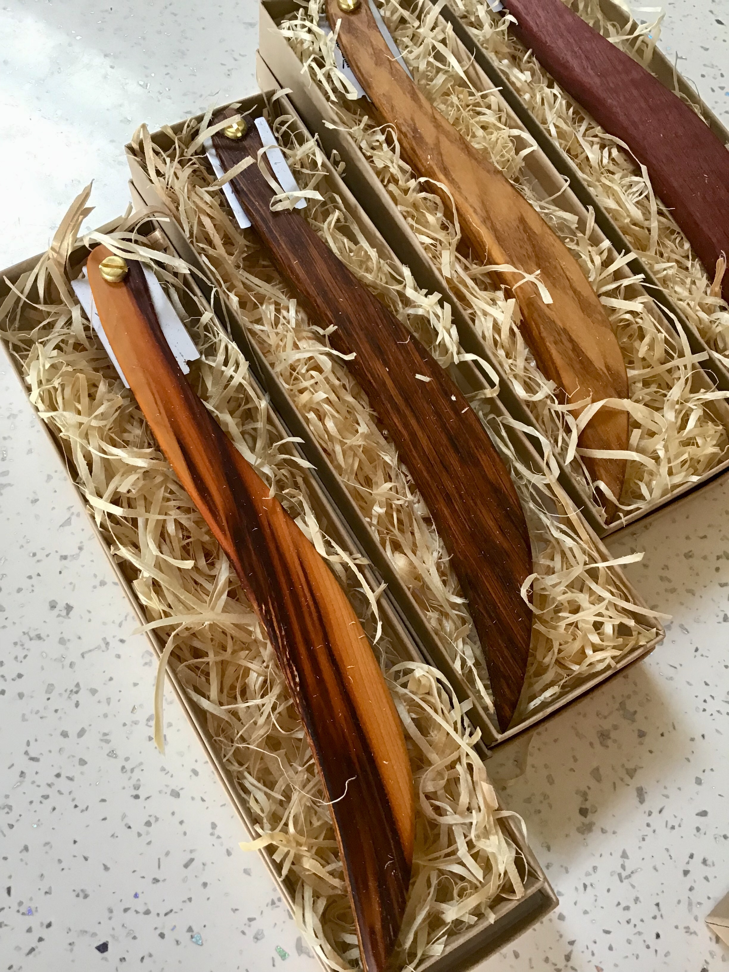 A box of wooden utensils in a gift box.