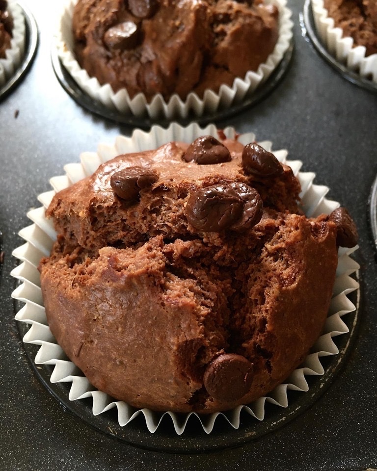 A muffin sitting on top of a table.