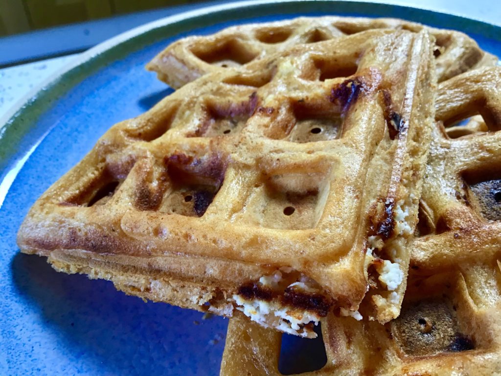 A close up of some waffles on a plate