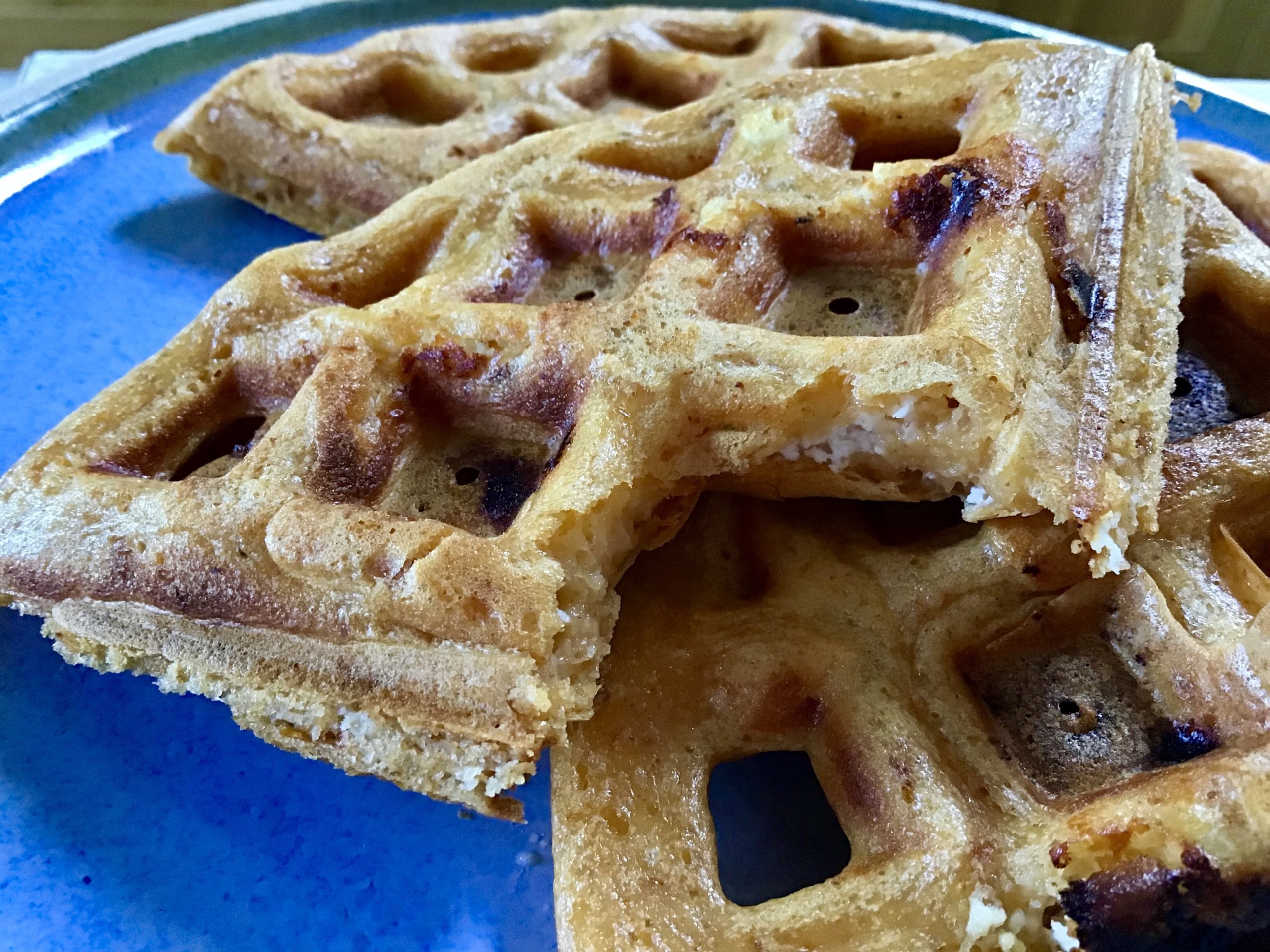 A close up of some waffles on a plate