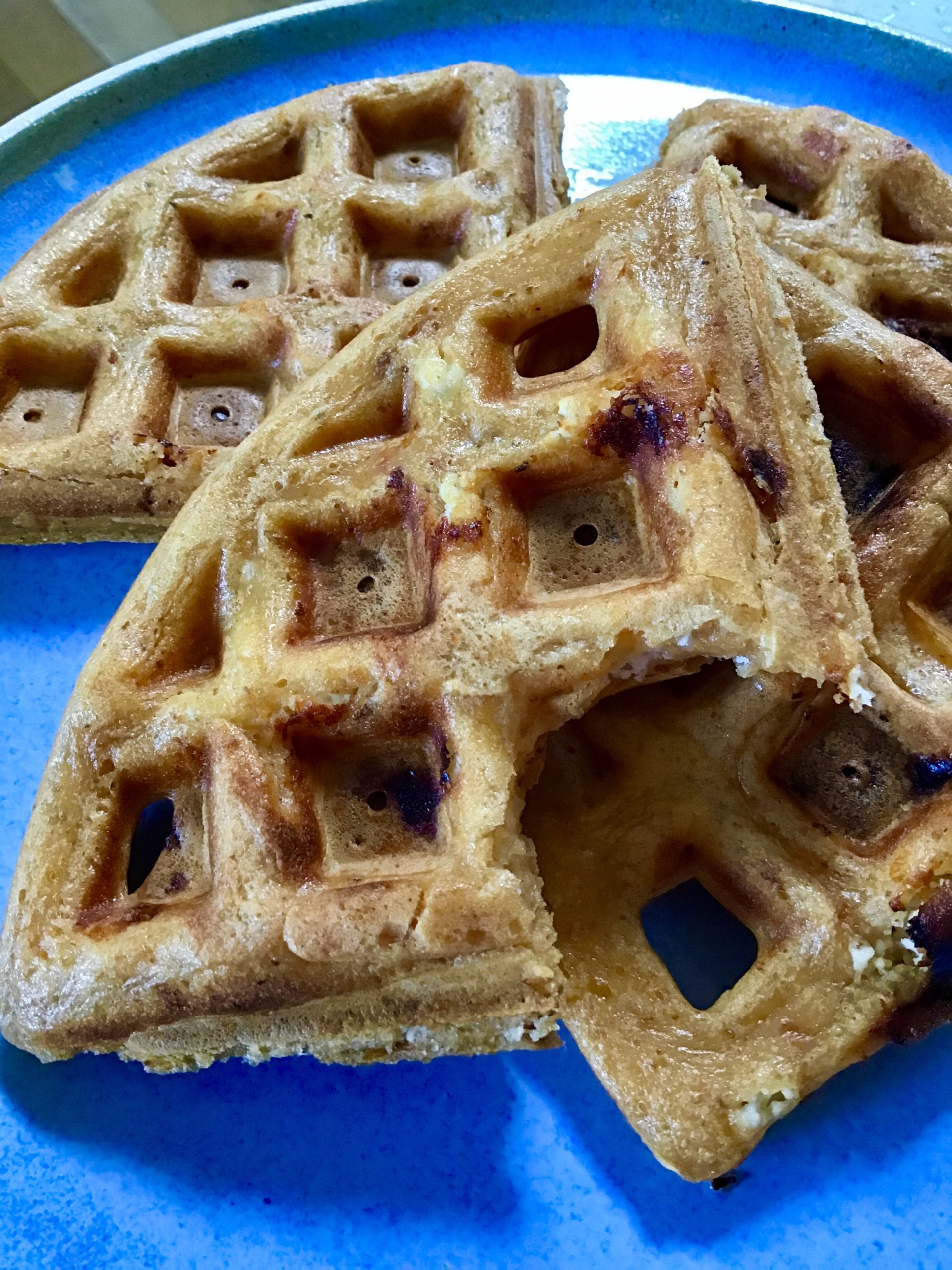 A close up of some waffles on a plate