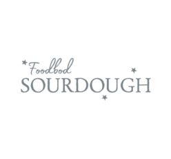 A gray and white logo of food for sourdough.